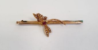 Gold-coloured metal dragonfly bar brooch set with seedpearls and oval cut ruby, unmarked