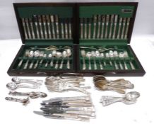 Assorted flatware community plate knives, forks, etc (2 canteens and 1 bag)