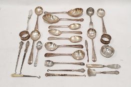 Two silver napkin rings, four silver handled button hooks and a white metal bowl with inset George