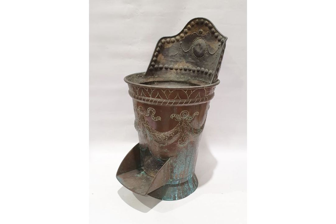 French copper wood carrier with scroll and swag decoration with handles to back with opening at base