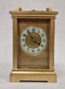 Substantial five-sided glass carriage clock, Arabic numerals on an enamel chapter ring on gilt