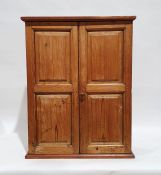 20th century pine wall-hanging two-door cupboard enclosing shelves, 77.5cm x 99cm