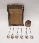 Six silver apostle spoons, a white metal napkin ring featuring African scenes and a photograph frame