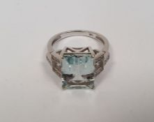 14K gold, aquamarine and diamond ring set central rectangular cut pastel blue aquamarine, approx.