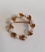 9ct gold and pearl circlet brooch interspersed with engraved foliage, in Gieves blue leather and