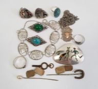 Silver pendant with gold applied vacant cartouche, a silver horseshoe stickpin, a pair of silver