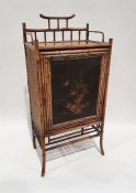 Victorian bamboo and lacquerwork cupboard with three-quarter galleried top above single cupboard
