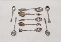 Chinese white metal teaspoon, possibly by Hung Chong, the stem decorated with figures in a landscape