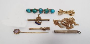 Gold-coloured stickpin set pale amethyst stone, a citrine set gold-coloured propelling toothpick,