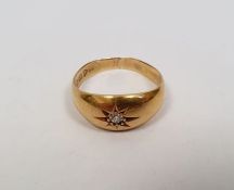18ct gold and diamond solitaire ring, gypsy set, in star-pattern setting, 4g approx.