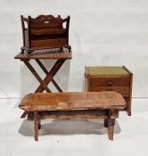 Coffee table in the form of naturalistic plank, a folding table, a piano stool and a magazine