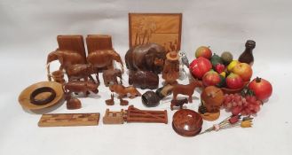 Box of wooden carved collectables to include an Erzgebirgische smoking figure, Erzgebirgische