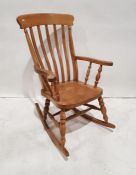 20th century beech slatback rocking chair on turned front legs to the rockers