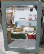 Modern rectangular wall mirror with green frame