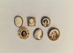 Gold-coloured metal and porcelain brooch, cherub decorated, another continental boy in cap, small