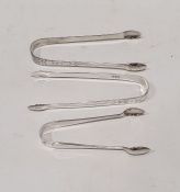 Three silver sugar tongs to include George III sugar nips, London 1807 by Samuel Godbehere, Edward