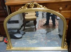 20th century overmantel mirror with arched top in gilt-effect frame, 90cm x 128cm