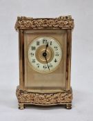 Late 19th century five-glass carriage clock with elaborate floral decoration to case, Arabic