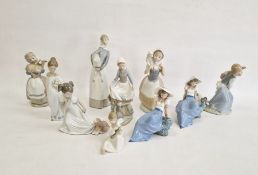 Lladro girl with lamb, another with rabbit, anothe