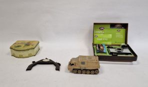 Dinky Toys Shado 2, a vintage clasp, a vintage tin and contents of a folded needlework sampler by