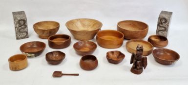 Assorted turned bowls and carved and polished stone bookends with snake decoration