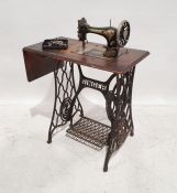 Singer sewing machine on treadle base, no.B123191
