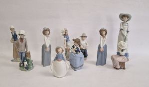 Nao goose girl, Nao boy and cat with dog, Nao group, girl with boy bandaging her foot and six