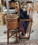 Oak umbrella stickstand with quantity of umbrellas and sticks (68 cm H) and an oak and copper-