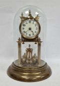 20th century anniversary clock with Arabic numerals to the enamel dial, housed in glass dome with