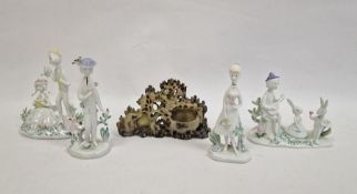 Four Rosenthal porcelain figures and groups, each in garden setting, various sized and a Chinese