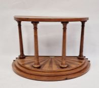 Demi-lune treen stand in the classical taste, the demi-lune top supported by four Corinthian columns