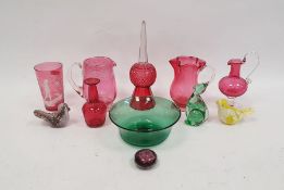 Mary Gregory cranberry glass beaker, a Bristol cranberry glass jug, signed to base, a Bristol