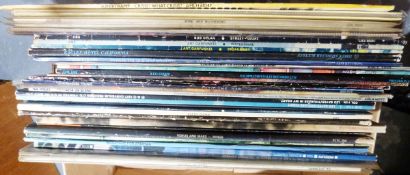 Box of LPs to include Genesis, Bob Dylan, Art Garfunkel, Supertramp, The Police, etc and a small