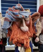 Oversized theatre prop head by Purves Puppets and a pair of moulded rubber hands. Provenance: