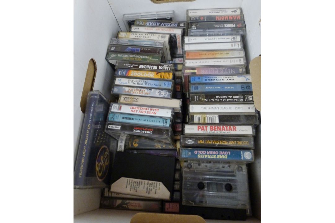 Box of cassette tapes to include The Human League, Pat Benetar, Dire Straits, Robert Palmer, Prince,