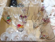 Set of six large wine glasses, a set of six champagne flutes, two ceramic models of elephants and