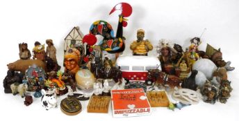 Quantity of assorted ornaments, ceramic ornaments, wooden ornaments, a cake and decorating cookie