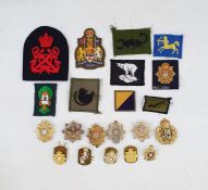 Collection of modern Military cap badges, rank markings and cloth badges.  Together with five