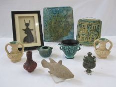 Egyptian copper alloy head and shoulders plaque of Isis, with solar disc (believed to be late