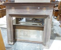 Art Nouveau fire surround with inlaid decoration, a further similar and an overmantel mirror (3)