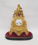 Mid 19th century ornate ormolu French mantel clock, the enamel dial with Roman numerals marked '