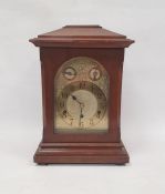 Bracket-type clock in mahogany case, on fun feet, the brass rectangular dial with Arabic numerals