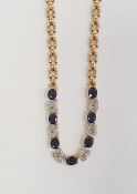 18ct gold chain necklace set with seven oval sapphires and diamond encrusted, 13g approx.