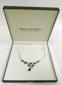 Silver and garnet necklace