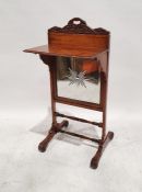 Victorian mahogany mirrored firescreen with fold-out shelf, on turned stretchered base, 97cm high