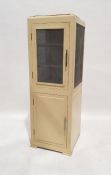 Cream painted food safe, the mesh cupboard door enclosing shelves above cupboard, 141cm x 47.5cm x