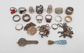 Silver circular St Christopher pendant, a silver ring set multi-coloured gemstones, a 9ct white gold