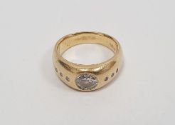 18ct gold yellow gold and diamond ring, the central diamond in rubover setting, 0.6/0.7ct approx.,