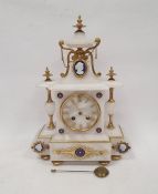 Ornately decorated white onyx mantel clock with blue and gold enamel medallions, turned brass and