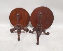 Two Victorian mahogany tripod tables with circular tops, moulded and turned columns, on cabriole